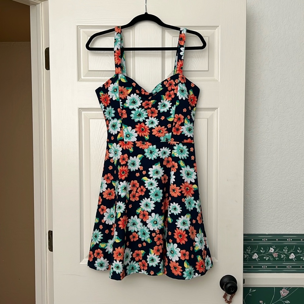 Navy blue dress with orange and blue flowers